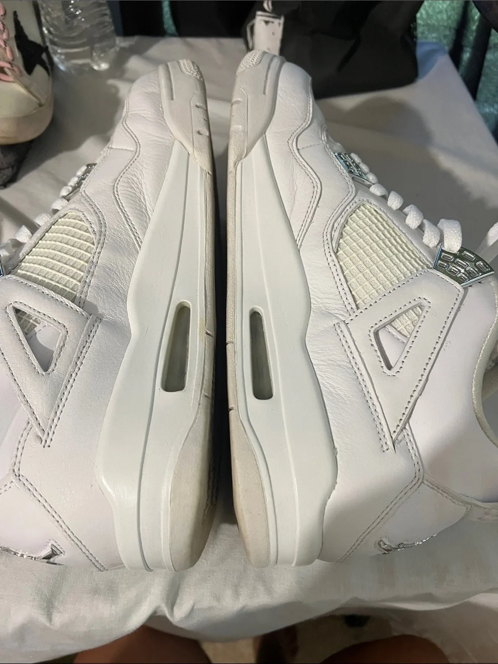 Air Jordan 4 Retro White Leather Sneakers